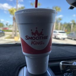 a smoothie in a plastic cup