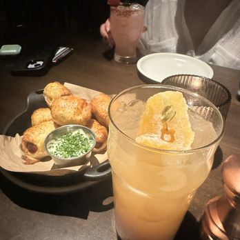 Culinary Dropout - Front: 2 to Mango Middle: Wagyu Pigs In a Blanket Back: Endless Summer Margarita - New American Near Me - Dallas, Texas