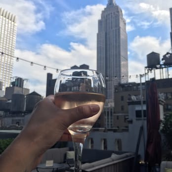 Refinery Rooftop - Rose, cheers to NYC - Lounges Near Me - New York, New York Refinery Rooftop - Rose, cheers to NYC - Lounges Near Me - New York, New York