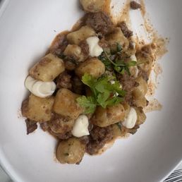 Pork sausage with gnocchi