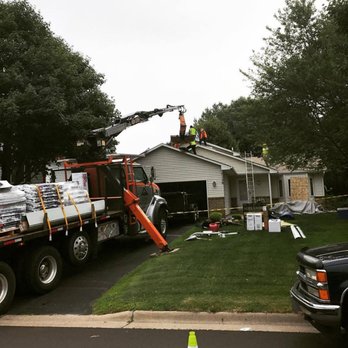 Alexander Exteriors - The correct way to load a roof with new shingles. - Roofing Near Me - Edina, Minnesota