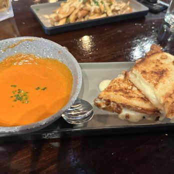 Revel Market and Bar - Grilled cheese and tomato soup. Duck fat fries back there too. - Bars Near Me - Richmond, Virginia Revel Market and Bar - Grilled cheese and tomato soup. Duck fat fries back there too. - Bars Near Me - Richmond, Virginia