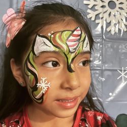 Hailey’s Face Painting - Candy cane unicorn