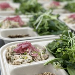 eatwelle - Chicken salad with pickles red onions, seeded crackers and fresh organic market greens served with a green goddess dressing
