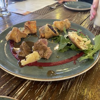Tortuga Beach - Sample appetizer platter  Shrimp gyoza Mini filet mignon Beetroot spring rolls - Tapas Bars Near Me - Cabo San Lucas, BCS