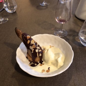 Le Foodist - Poached pear chocolate sauce with sliced almonds homemade cream anglaise ice cream. - Cooking Schools Near Me - Paris, 75 Le Foodist - Poached pear chocolate sauce with sliced almonds homemade cream anglaise ice cream. - Cooking Schools Near Me - Paris, 75