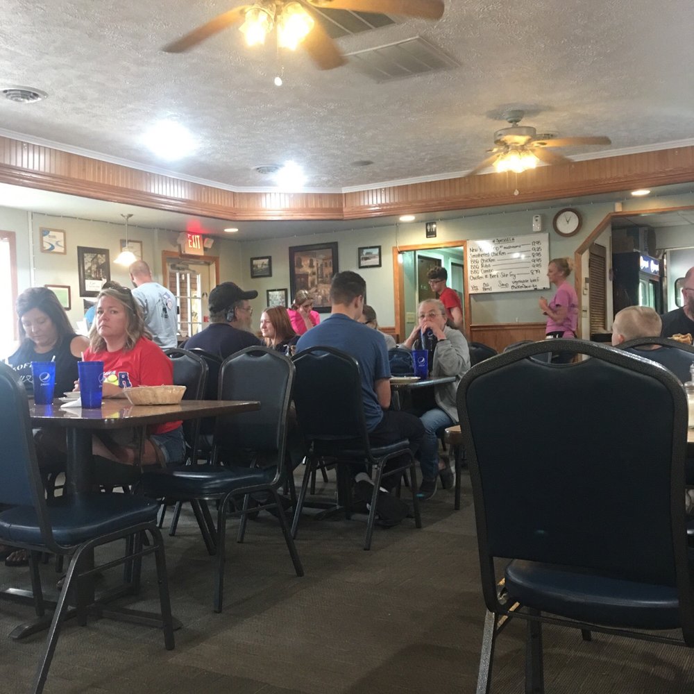 Coffee Cup - a group of people sitting at a table - Coffee & Tea Near Me - Terre Haute, Indiana