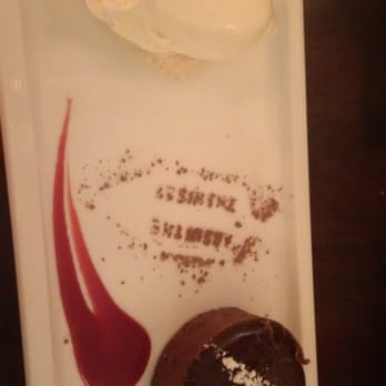 Absinthe Bistro - Chocolate lava cake with vanilla bean ice cream - French Near Me - Vancouver, British Columbia