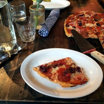 The Parlour - The Standard pizza from The Parlour (pepperoni, button mushroom, red pepper, onion, bacon, olive, mozza). *Soy cheese; gluten-free crust. - Pizza Near Me - Vancouver, British Columbia The Parlour - The Standard pizza from The Parlour (pepperoni, button mushroom, red pepper, onion, bacon, olive, mozza). *Soy cheese; gluten-free crust. - Pizza Near Me - Vancouver, British Columbia