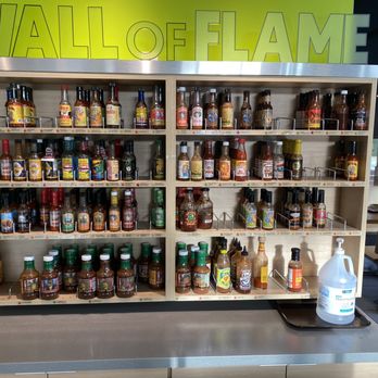 California Tortilla - The coup de grace, the hot sauce wall! - Mexican Near Me - Charleston, South Carolina