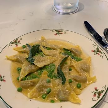 Rocca - RAVIOLI short rib filling, english peas, parmigiano, sage - Italian Near Me - Tampa, Florida Rocca - RAVIOLI short rib filling, english peas, parmigiano, sage - Italian Near Me - Tampa, Florida