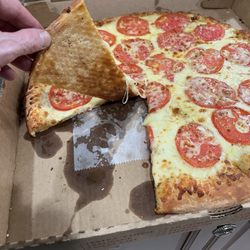 Pizza Siena - White pizza with tomatoes.  Crust cooked perfect