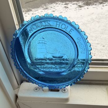 Sandwich Glass Museum - A typical Cape Cod glass plate in my kitchen window. About four inches in diameter; colored glass, and emblazoned with some event or place. - Museums Near Me - Sandwich, Massachusetts Sandwich Glass Museum - A typical Cape Cod glass plate in my kitchen window. About four inches in diameter; colored glass, and emblazoned with some event or place. - Museums Near Me - Sandwich, Massachusetts