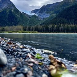 RL AK Outdoors - Calm Alaskan river side with scenic view of Byron glacier.