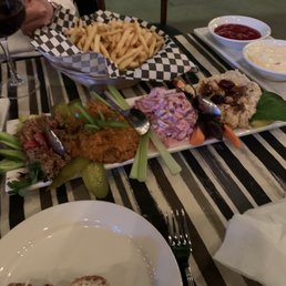 Photo of Serra's Dine & Dance - Studio City, CA, United States. Delicious appetizer plate and fries.