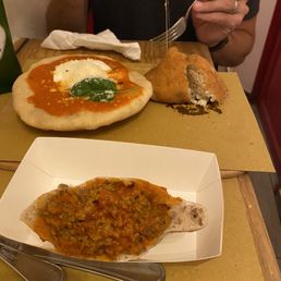 Meatball scaccoccia (front), Arancino cacio e Pepe (right), Montanare with Buffalo moz (left) Meatball scaccoccia (front), Arancino cacio e Pepe (right), Montanare with Buffalo moz (left)