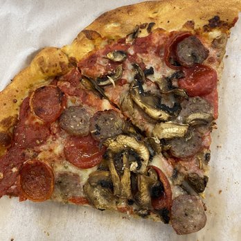 Stonefire Grill - Stone Fire pizza with pepperoni, mushroom and sausage. - American Near Me - Irvine, California