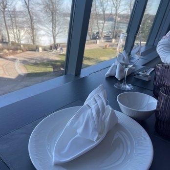 Golden Lotus - a table setting with a view of a lake - Chinese Near Me - Niagara Falls, Ontario