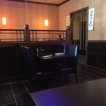 Six Happiness - a table and chairs in a restaurant - Thai Near Me - Cleveland, Tennessee Six Happiness - a table and chairs in a restaurant - Thai Near Me - Cleveland, Tennessee