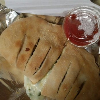 Memphis Pizza Cafe - Chicken, spinach and mushrooms calzone.  You know you want one ;) - Pizza Near Me - Memphis, Tennessee