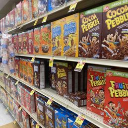 a cereal aisle in a grocery store