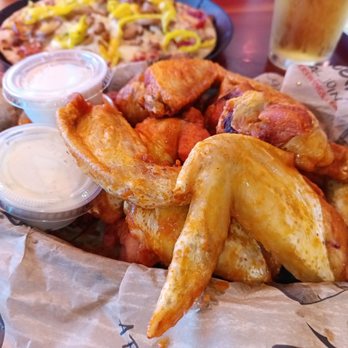 Roosters Circleville - a platter of chicken wings and fries - Chicken Wings Near Me - Circleville, Ohio