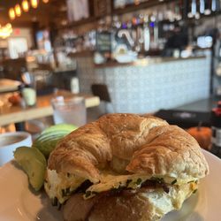 Press & Plow - Croissant Sandwich sub: scrambled eggs with fried eggs.