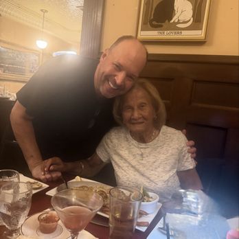 Fairgrounds Hotel - Mom enjoying her meal... and our sensational server, Frank!!! - Seafood Near Me - Allentown, Pennsylvania