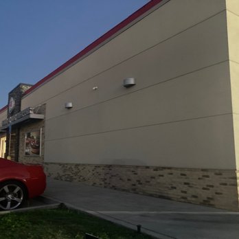 Burger King - a red car parked in front of a restaurant - Burgers Near Me - Bossier City, Louisiana Burger King - a red car parked in front of a restaurant - Burgers Near Me - Bossier City, Louisiana
