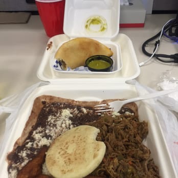 La Taguara - Pabellon and a beef empanada - Venezuelan Near Me - Madison, Wisconsin La Taguara - Pabellon and a beef empanada - Venezuelan Near Me - Madison, Wisconsin