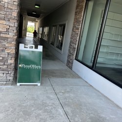 This is the sign going into the alley of the store