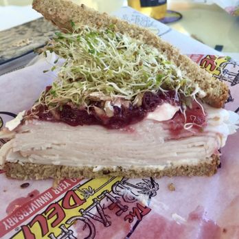 Beach Hut Deli - Beach Bikini sandwich ~ Turkey, sprouts, cranberry sauce, sunflower seeds, cream cheese and mayo on good grainy wheat bread. - Sandwiches Near Me - Dana Point, California Beach Hut Deli - Beach Bikini sandwich ~ Turkey, sprouts, cranberry sauce, sunflower seeds, cream cheese and mayo on good grainy wheat bread. - Sandwiches Near Me - Dana Point, California