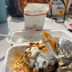 Yassa Grill - Gyro and onion rings Lamb & Chicken Gyro Onion Rings