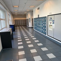 US Post Office - Nice and spacious mailbox area. Plenty of counter space.