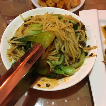 Chengdu Taste - dan dan noodles, pickles in the back - Szechuan Near Me - Providence, Rhode Island