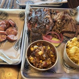 Ribs, brisket, pulled pork, Brunswick stew, Mac-n-cheese and jalapeño/cheddar sausage. Ribs, brisket, pulled pork, Brunswick stew, Mac-n-cheese and jalapeño/cheddar sausage.