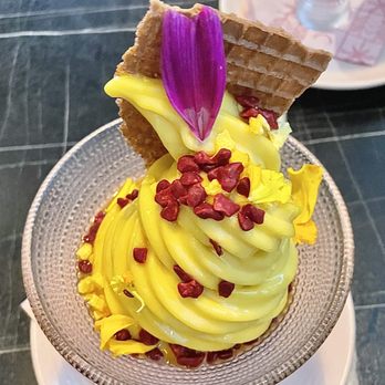 Joy by Seven Reasons - Manguito, Alphonso Mango Soft Serve, Waffle Pieces, Passion Fruit Syrup, Crispy Raspberry - Latin American Near Me - Chevy Chase, Maryland Joy by Seven Reasons - Manguito, Alphonso Mango Soft Serve, Waffle Pieces, Passion Fruit Syrup, Crispy Raspberry - Latin American Near Me - Chevy Chase, Maryland
