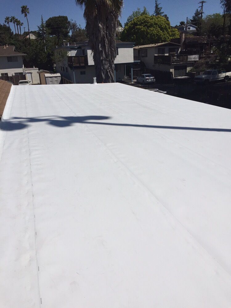 Slide of T&K Roofing