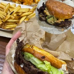 The Flamin' Smash, a BYO DOUBLE, Fries - SMALL, and Loaded Fries - SMALL The Flamin' Smash, a BYO DOUBLE, Fries - SMALL, and Loaded Fries - SMALL