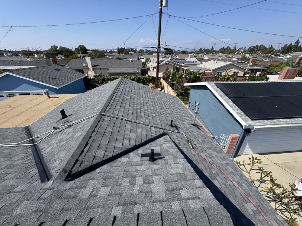 Slide of M&M Elite Roofing