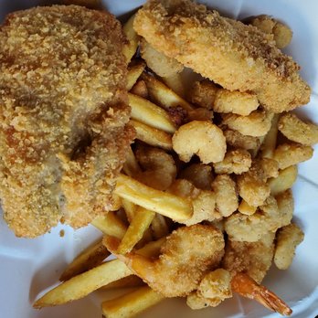 Seabolt's Restaurant - Part of the captain's platter- three types of fried fish: salmon, cod, and halibut, shrimp, and French fries. - Seafood Near Me - Oak Harbor, Washington Seabolt's Restaurant - Part of the captain's platter- three types of fried fish: salmon, cod, and halibut, shrimp, and French fries. - Seafood Near Me - Oak Harbor, Washington