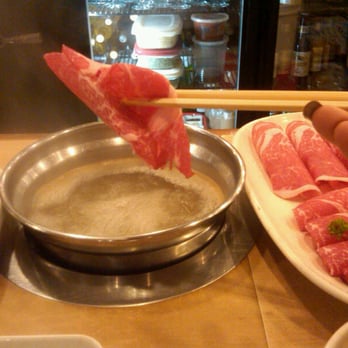 Shabu-Zen - Getting ready to dip the beef in! Cooks in under 30 seconds! - Japanese Near Me - Boston, Massachusetts Shabu-Zen - Getting ready to dip the beef in! Cooks in under 30 seconds! - Japanese Near Me - Boston, Massachusetts
