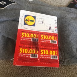 a picture of a $ 10, 000 gift card and a $ 10, 000 t - shirt