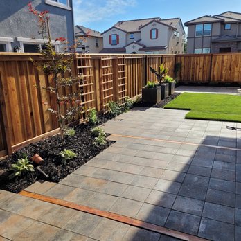PN Landscape - a backyard with a wooden fence - Landscaping Near Me PN Landscape - a backyard with a wooden fence - Landscaping Near Me