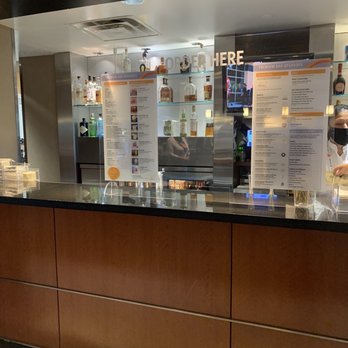 Delta Sky Club - Bar area Delta Sky lounge - Airport Lounges Near Me - Tampa, Florida