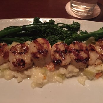 Seasons 52 - Scallops over butternut squash risotto and broccolini - New American Near Me - Burlington, Massachusetts