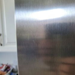 A & E Factory Service - Scratches to the new door.