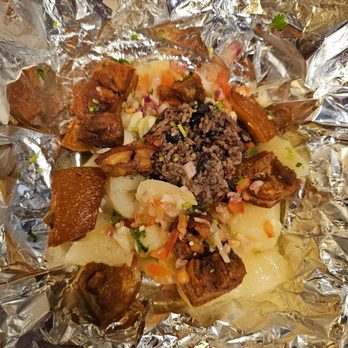 Tropicana Bar & Grill - Yuca con Chicharron / Cassava with Fried Pork - Cuban Near Me - Myrtle Beach, South Carolina Tropicana Bar & Grill - Yuca con Chicharron / Cassava with Fried Pork - Cuban Near Me - Myrtle Beach, South Carolina