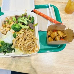 Vegan orange chicken, vegan beef and broccoli, lo mein, ma po tofu.