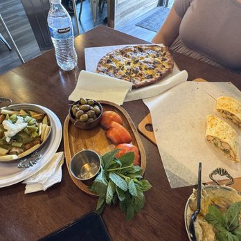 Zaatar N More - Chicken Shawerma Wrap, hummus, fresh veges, chicken shawarma bowl (made by the owner upon request), Egg and Soujouk pizza. - Pizza Near Me - Northridge, California Zaatar N More - Chicken Shawerma Wrap, hummus, fresh veges, chicken shawarma bowl (made by the owner upon request), Egg and Soujouk pizza. - Pizza Near Me - Northridge, California